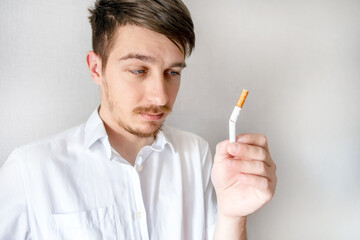 Pensive Young Man with a Cigarette