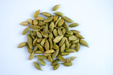 Small pile of green cardamom concept background