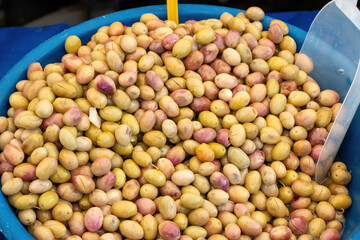 Background of green olives close up