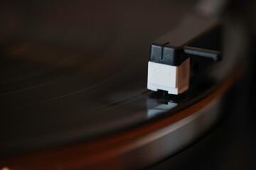a close up of a dj turn table playing vinyl record