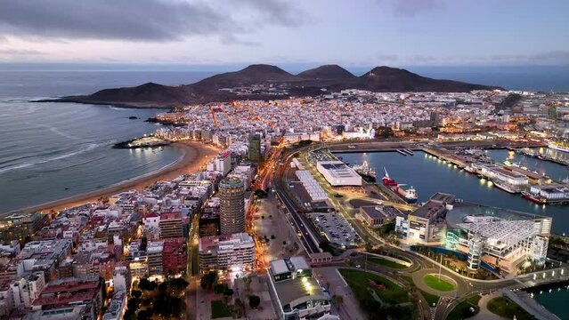 4k Aerial view of Las Palmas de Gran Canaria, the capital city of the Canary Islands. Spain. Playa de Las Canteras beach