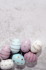 decorative eggs in the background, top view. Banner. Easter eggs on a marble background. Minimal concept. View from above. Card with copy space for text