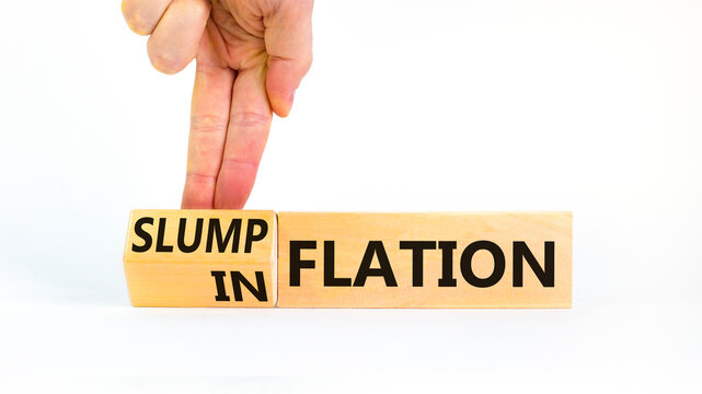 Inflation or slumpflation symbol. Concept word Inflation Slumpflation on beautiful wooden cubes. Beautiful white background. Businessman hand. Business inflation slumpflation concept. Copy space. - Powered by Adobe