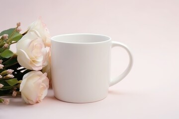 Fototapeta na wymiar A blank white coffee mug next to white roses on a pale background. Minimalist White Coffee Mug with Roses