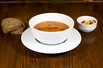 Cream soup puree with mushroom on wooden background