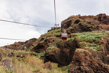 Cable car going to the beach of Garajau, Canico, Madeira island, Portugal, Europe. Panoramic view...