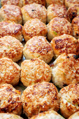 semi-finished meatballs. lightly fried meatballs are ready to cook. Meatballs background. Close up