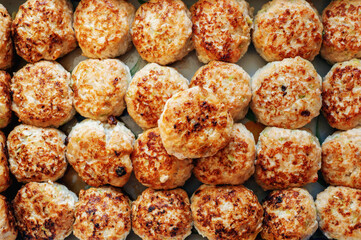 semi-finished meatballs. lightly fried meatballs are ready to cook. Meatballs background.