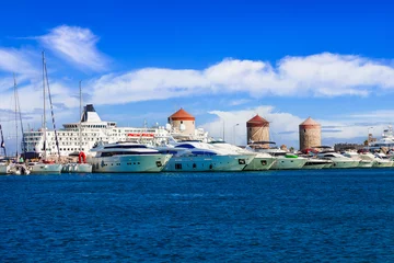 Foto op Plexiglas Greece travel, Dodecanese. Rhodes island.  Mandraki Harbor with cruise ships and old windmils © Freesurf