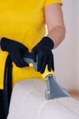 hand holding a cleaning tool