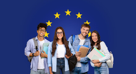 Cheerful group of four college friends with books standing before a European Union flag