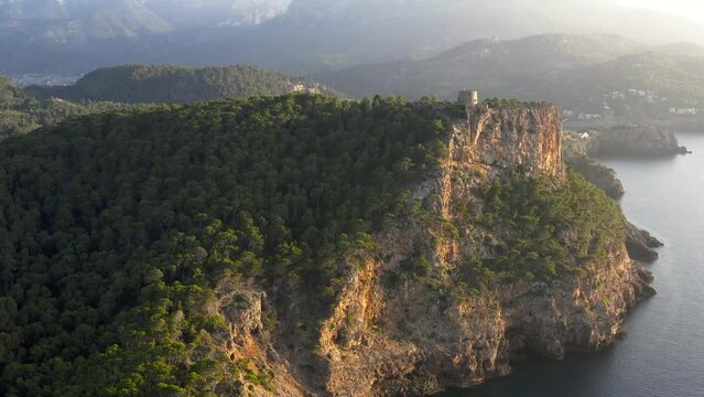 Amazing drone view of the Mallorcan landscape. Scenic aerial view of the tourist town of Port de Soller on a sunny day. Mallorca, Majorca, Spain, Balearic Islands