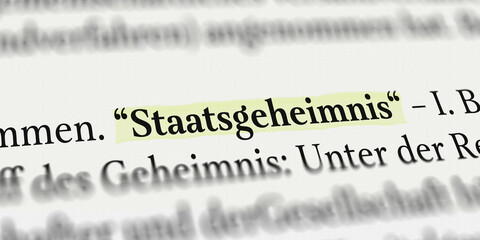 Das Wort Staatsgeheimnis im Buch mit Textmarker markiert