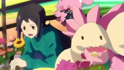 Anime girl with dark hair in a green cape sits on the veranda against a background of nature