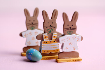 Three wooden toy easter bunnies