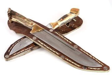 Hunting knife in a leather sheath