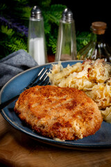 Minced meat cutlet with boiled sauerkraut.