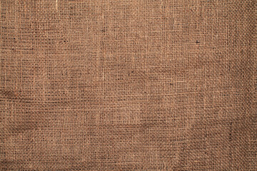 Close-up detail of fabric natural color Hemp material pattern design wallpaper. can be used as background or for graphic design. Natural linen material textile canvas Fabric texture background
 - obrazy, fototapety, plakaty