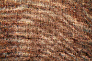 Close-up detail of fabric natural color Hemp material pattern design wallpaper. can be used as background or for graphic design. Natural linen material textile canvas Fabric texture background
