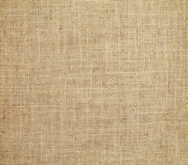 Close-up detail of fabric natural color Hemp material pattern design wallpaper. can be used as...