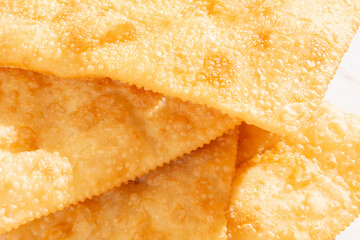Fried Pastels Brazilian Pastel de Feira on a basket clean background isolated front top view
