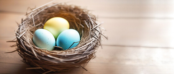 Stylish Easter eggs in the nest are arranged exactly on a wooden background, there is a place to copy. There is a lot of space for text on the right.