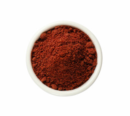 Dried cranberry powder in bowl isolated on white, top view