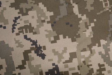 Texture of camouflage fabric as background, top view