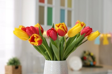 Easter celebration. Bouquet of beautiful tulips on blurred background, closeup