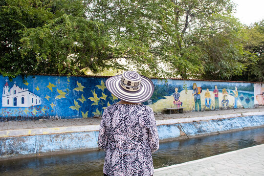 ARACATACA, COLOMBIA - FEBRUARY 2, 2024: Senior woman tourist at the Macondo Linear Park in Aracataca the birthplace of the Colombian Literature Nobel Prize Gabriel Garcia Marquez