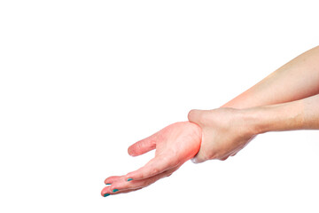 woman's hands holding sore wrist on white background