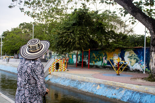 ARACATACA, COLOMBIA - FEBRUARY 2, 2024: Senior woman tourist at the Macondo Linear Park in Aracataca the birthplace of the Colombian Literature Nobel Prize Gabriel Garcia Marquez