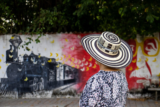 ARACATACA, COLOMBIA - FEBRUARY 2, 2024: Senior woman tourist at the Macondo Linear Park in Aracataca the birthplace of the Colombian Literature Nobel Prize Gabriel Garcia Marquez