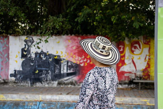ARACATACA, COLOMBIA - FEBRUARY 2, 2024: Senior woman tourist at the Macondo Linear Park in Aracataca the birthplace of the Colombian Literature Nobel Prize Gabriel Garcia Marquez