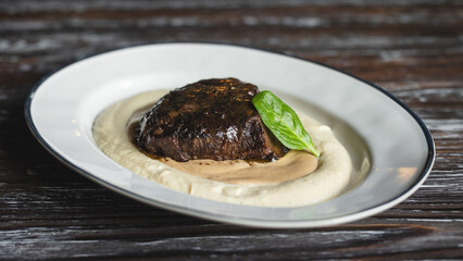 Beef steak, cheek, tenderloin. Food photography, dark shades.