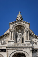 Obraz premium Paris Basilica Sacre Coeur at top of Montmartre - Roman Catholic Church and minor basilica, dedicated to Sacred Heart of Jesus. Paris, France.