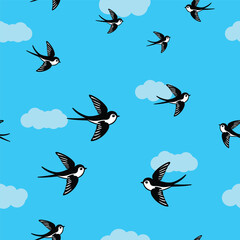 Swallow birds flying in the sky seamless pattern