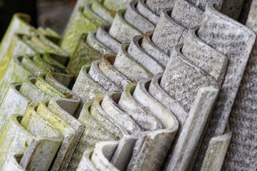 Asbestos roofing, corrugated eternit close-up.