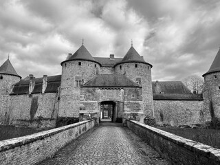 The Castle of Corroy-le-Chateau (French: Château de Corroy-le-Château) is a medieval castle in the village of Corroy-le-Château, in the province of Namur, Wallonia, Belgium. Black and white photo
