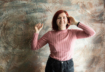 Portrait of a girl from the waist up. Gentle, carefree, friendly, modern, gorgeous girl
