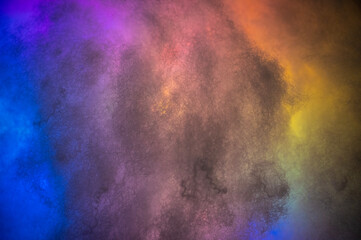Different colors crossing through clouds making abstract wallpaper