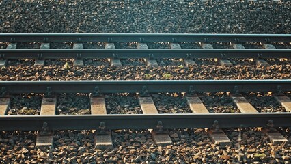 Railway Tracks on Pebble Rock Ballast Trackbed and Railway Sleepers