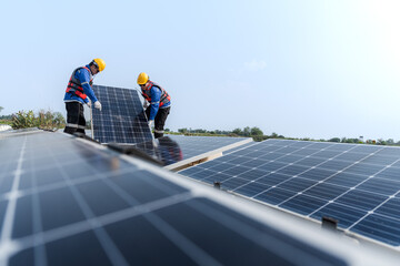 Male workers repair Floating solar panels on water lake. Engineers construct on site Floating solar...