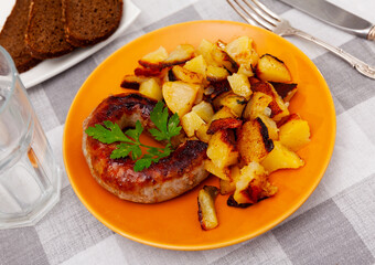 Spanish pork sausages butifarras with boiled potatoes