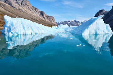 Beautiful iceberg reflected in fjord near Skoldungen, East Greenland