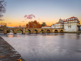 View of Trajan's Roman bridge, reflected on Tamega river, Chaves, Portugal