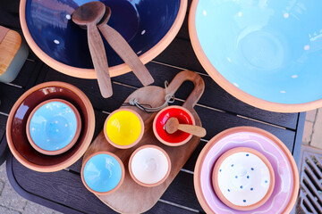 original vintage ceramic dishes on a wooden table at a flea market