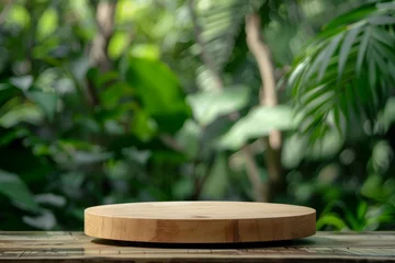 Fototapeten Outdoor podium in tropical forest with blurred green leaf background Natural cosmetic product display on pedestal stand embodying the summer jungle © VolumeThings