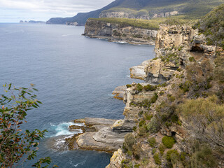 Rugged sea cliffs at the Tasman Peninsula, Tasmania, Australia