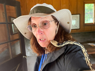A Mature Woman Naturalist Experiencing a Gopher Snake for the First Time showing ophidiophobia,  The Fear of Snakes